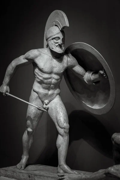 Man in helmet Greek ancient sculpture of warrior