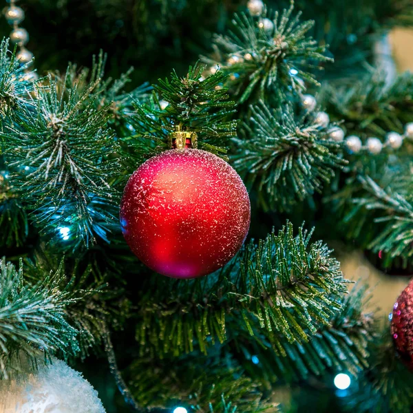 Christmas decorations on the branches of fir tree — Stock Photo, Image