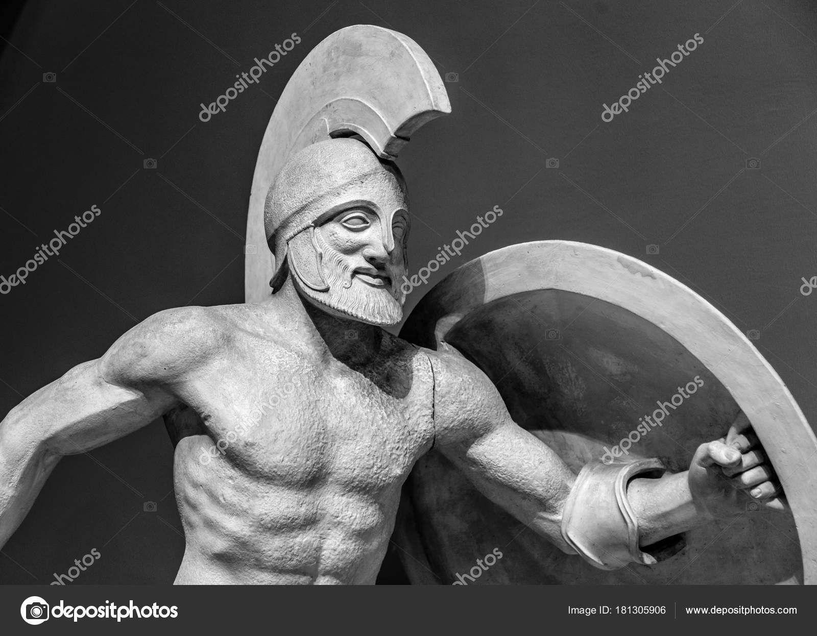 Roman statue of warrior in helmet Stock Photo by ©gilmanshin 181305906