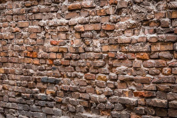 Old messy brick wall texture background exterior — Stock Photo, Image