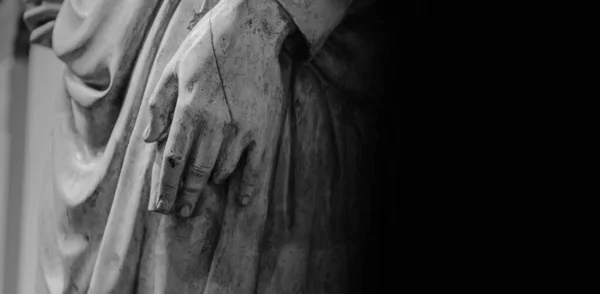 Man hand on antique tunic. Stone statue detail of human hand. Folds in the fabric. Copyspace for text — Stock Photo, Image