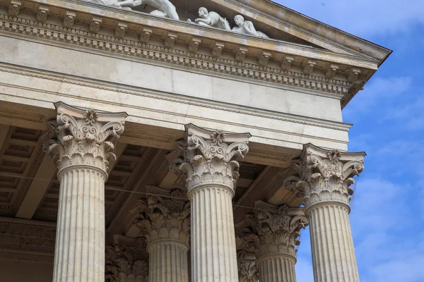 Vintage Old Justice Courthouse Column. Neoclassical colonnade with corinthian columns as part of a public building resembling a Greek or Roman temple Royalty Free Stock Images