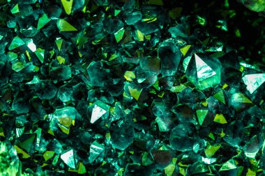 Emerald, Sapphire or Tourmaline green crystals. Gems. Mineral crystals in the natural environment. Stone of precious crystals on white background is insulated clipart