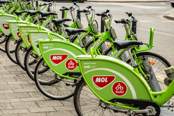 Budapest, Hungary - March 25, 2018: Public green bicycles to rent in the center of the Hungarian city. Bike-sharing. Ecological means of transport. Measure in the towns against air pollution. Bikes — Stock Photo, Image