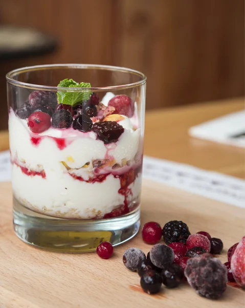 Greek yogurt with cereal and jam — Stock Photo, Image