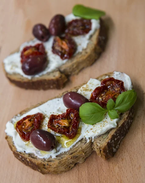 Sandwiches with dried tomatoes — Stock Photo, Image
