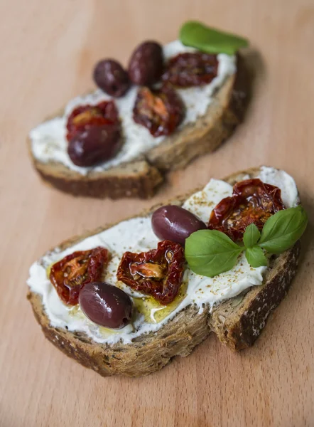 Sandwiches with dried tomatoes — Stock Photo, Image