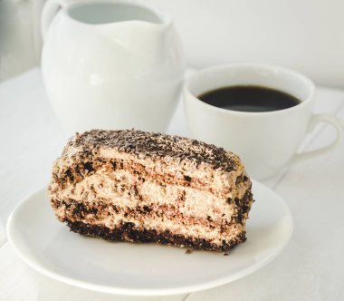 Chocolate cake and cup of coffee