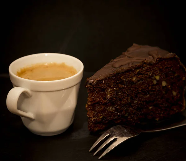 Slice of chocolate cake and coffee — Stock Photo, Image