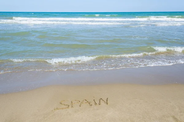 Ισπανία Γραμμένο Στην Άμμο Στην Παραλία — Φωτογραφία Αρχείου