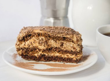 Chocolate cake and cup of coffee