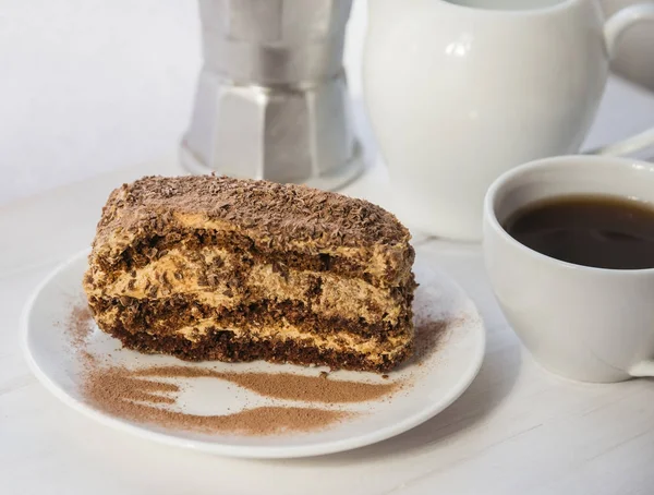 Chocolate cake and cup of coffee