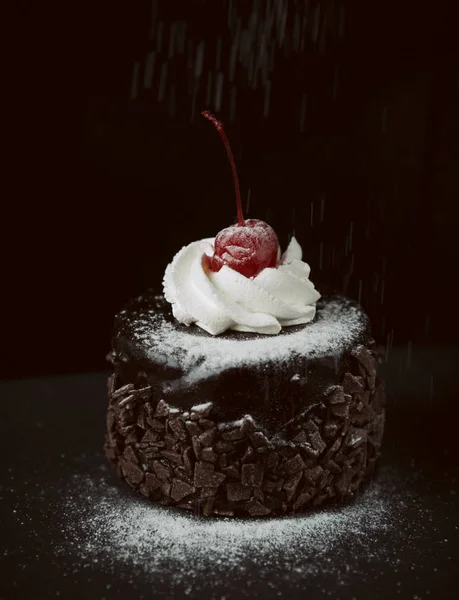 Chocolate cake with red cherry — Stock Photo, Image