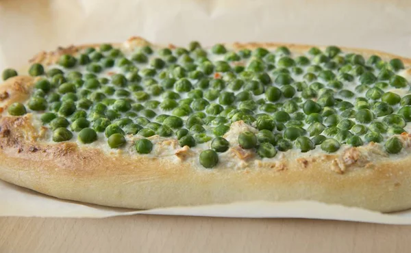 Homemade vegetable pie with green peas