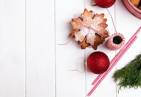 Christmas cookies and decor on white table — Stock Photo, Image