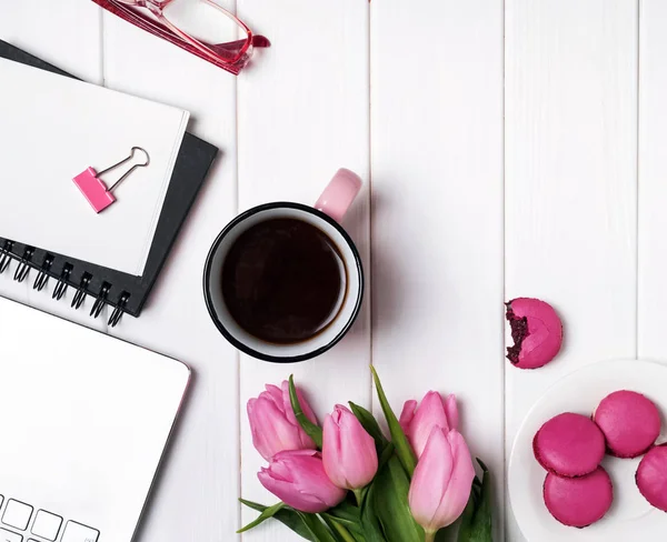 Pink tulips and accessories on white wooden table — Stock Photo, Image