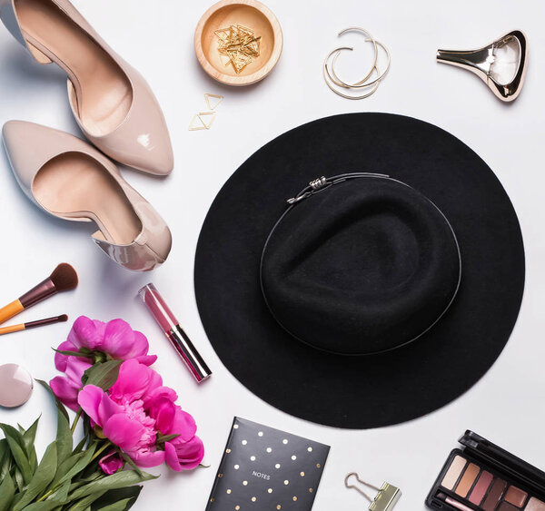 Woman's stylish accessories on white background