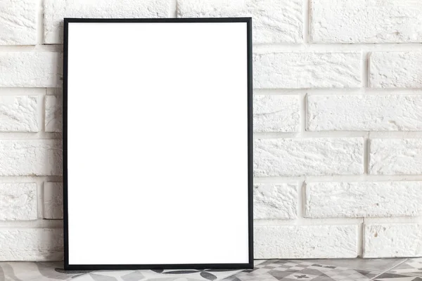 Empty frame mock-up in minimalist interior