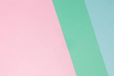 Pastel pembe ve nane renkleriyle soyut modern arkaplan.