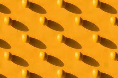 Canlı sarı arka planda taze limon deseni