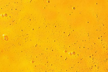 Yüzey sarı ballı balla kaplı.