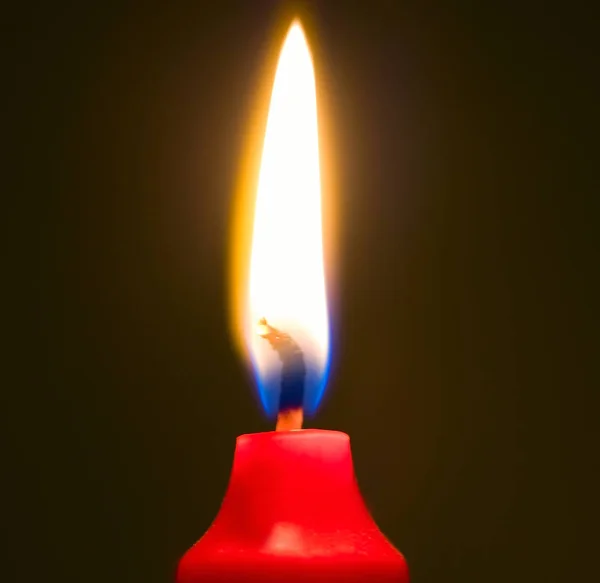 Flame candle in the dark background — Stock Photo, Image