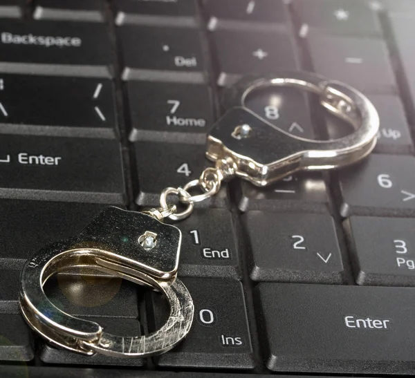 Handcuffs Laptop Keypad — Stock Photo, Image