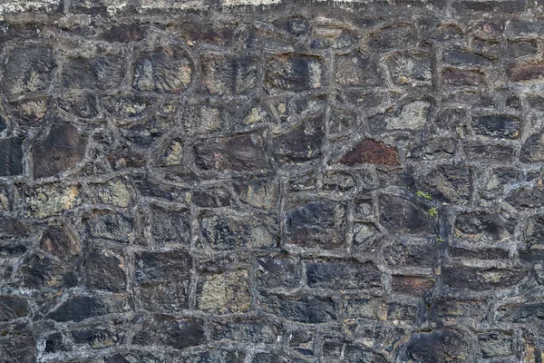 Muur achtergrond textuur zwarte steen — Stockfoto