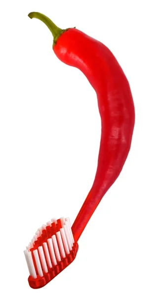 Cepillo de dientes rojo pimienta chile aislado en el fondo —  Fotos de Stock