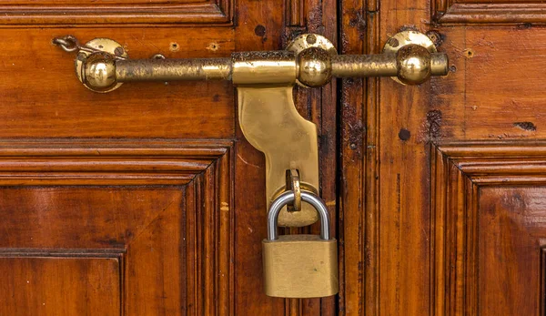 Old fashioned locks bolt with wood door — Stock Photo, Image