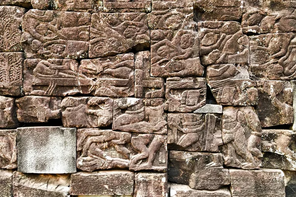 Fondo de la estatua de Bajorrelieve de la cultura jemer en Angkor Wat, Cam — Foto de Stock