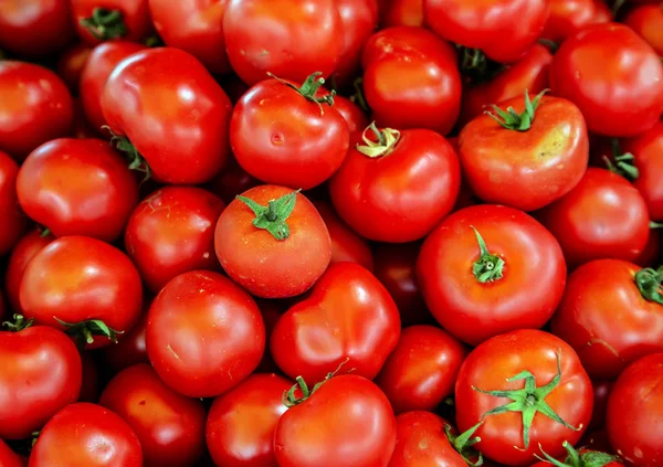 Fresh red tomatoes closeup vegetable background Top view — Stock Photo, Image