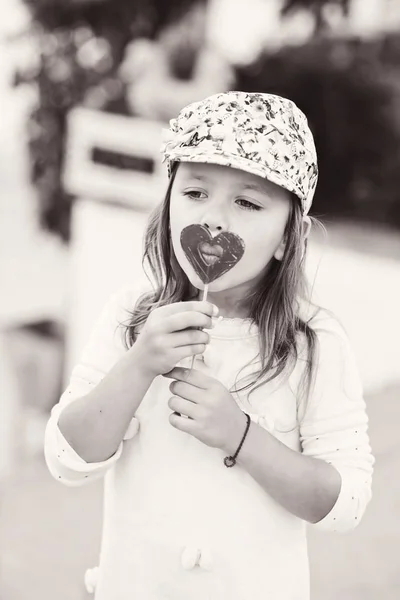 Girl with lollipop — Stock Photo, Image