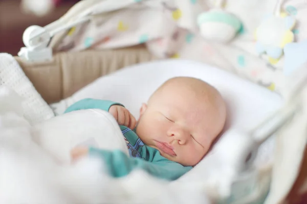 Newborn sleeping in crib — Stock Photo, Image