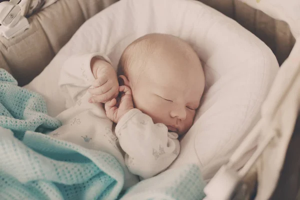 Baby in crib — Stock Photo, Image