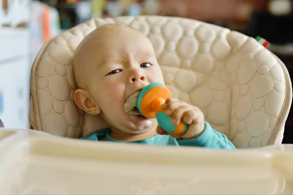 Baby with nibbler — Stock Photo, Image