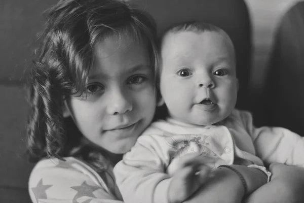 Two Sisters Home Smiling Hugging Soft Selective Focus — Stock Photo, Image