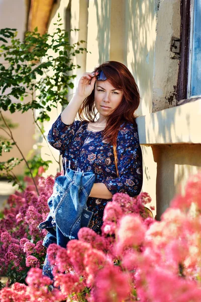 Redhead woman in spring — Stock Photo, Image