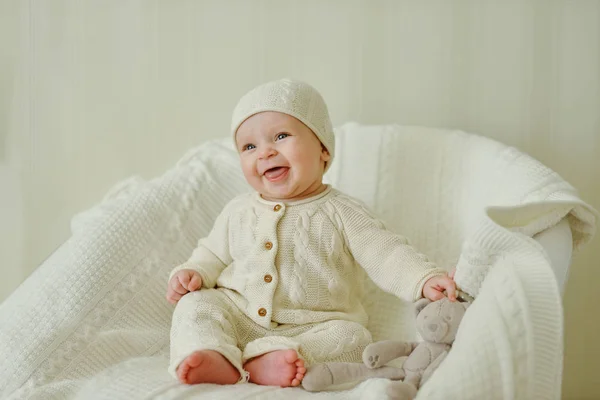 Happy baby on the chair — Stock Photo, Image