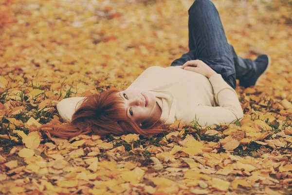 Redhead girl  in fall — Stock Photo, Image