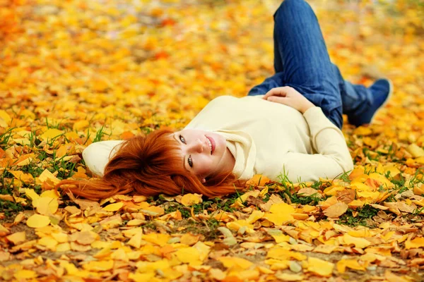 Redhead girl  in fall — Stock Photo, Image