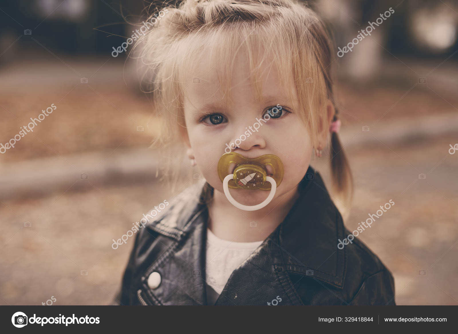 Toddler with dummy — Stock Photo © Reanas #329418844