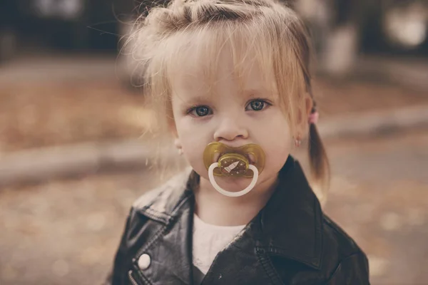 Toddler with dummy — Stock Photo, Image