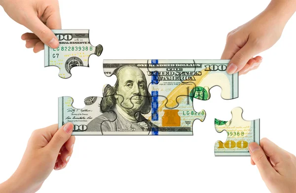 Hands and money puzzle — Stock Photo, Image