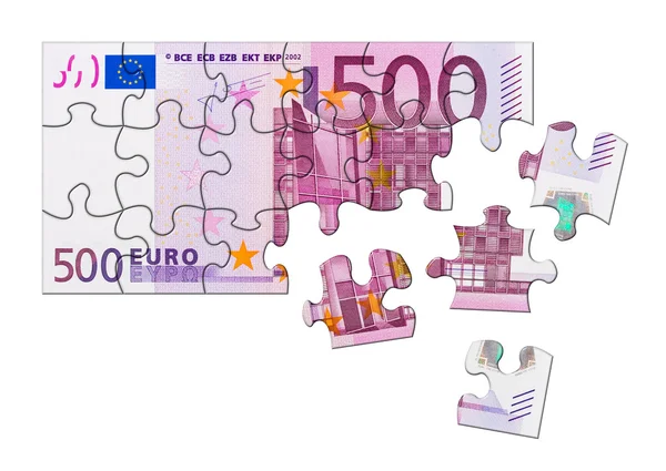 Geld puzzel geïsoleerd op witte achtergrond — Stockfoto