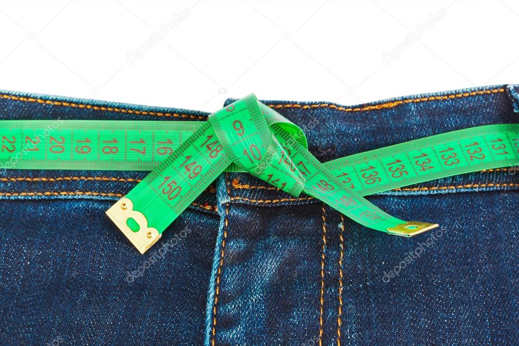 Jeans and measuring tape - slimming concept