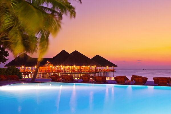 Pool and cafe on tropical Maldives island