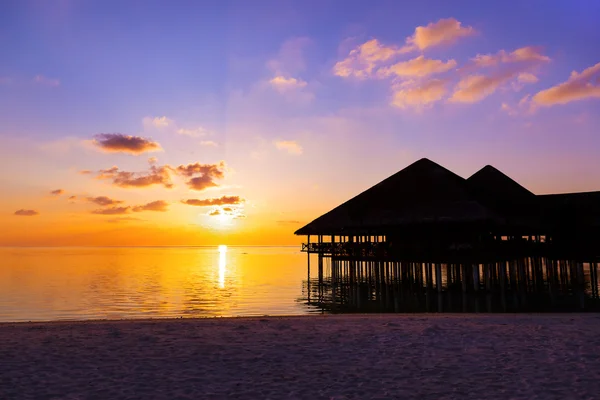 Water cafe at sunset - Maldives — Stock Photo, Image