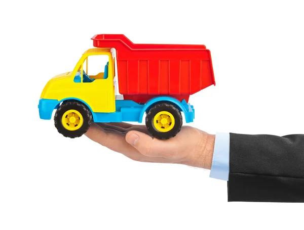 Spielzeugauto-Truck in der Hand — Stockfoto