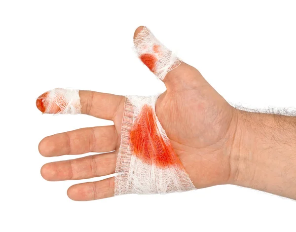 Hand med blod och bandage — Stockfoto